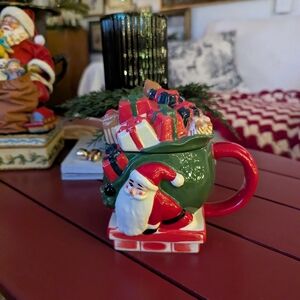 West Elm figural covered mug Santa with a sack